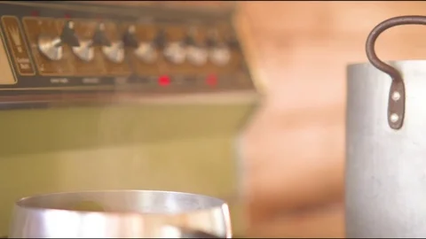 Steam coming out from pan in kitchen at home Stock Footage 76097587