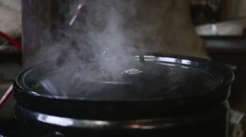 Steam coming from pot full of meat in slow motion Stock Footage 44295178