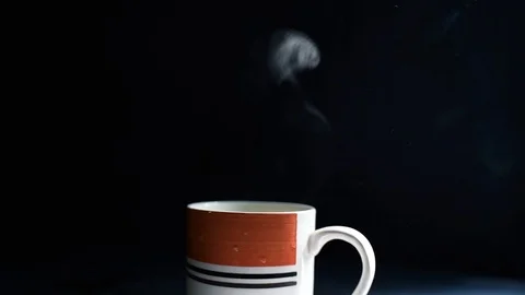 Steam from a cup with boiling water Stock Footage 121580658