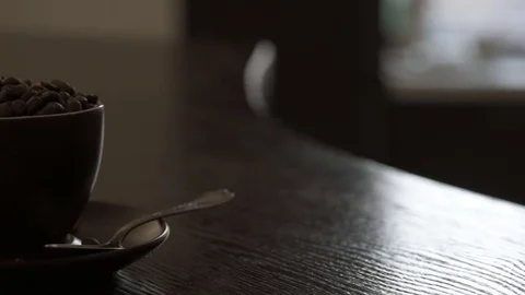 Steam from a cup  full roasted with a hot coffee beans . Stock Footage 84203768