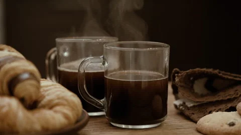 Steam from a cups with a hot coffee . 库存影片 86013328