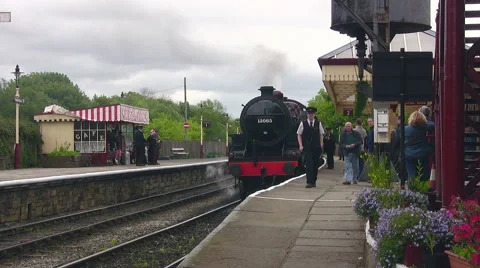 Steam engine 13065 pulls its train from Ramsbottom on the East Lancs Railway Stock Footage 59169336