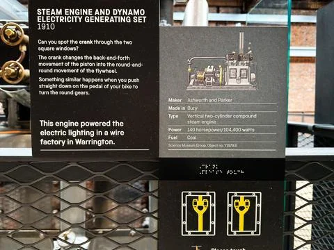 Steam engine and dynamo electricity generating set 1910 exhibit sign at sci.. Stock Photos
