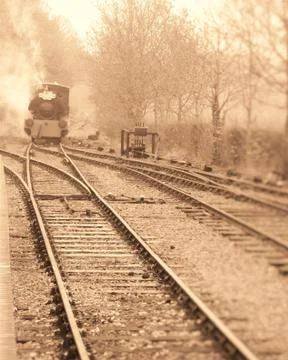 Steam Engine approaching station Stock Photos