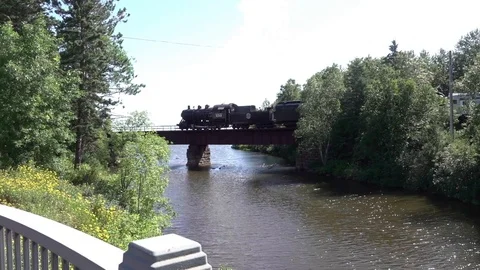 Steam Engine Crossing trestle Stock Footage 124925546