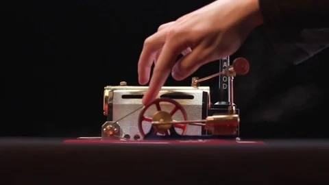 Steam Engine - hand starts machine Stock Footage 84065135