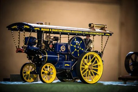  steam-engine MILDENBERG, GERMANY - MAY 05: model of a blue and yellow ste... Stock Photos