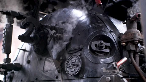 Steam engine in process Stock Footage 124077436