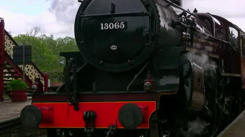 Steam engine train 13065 leaving Ramsbottom on the East Lancs Railway Stock Footage 59169100