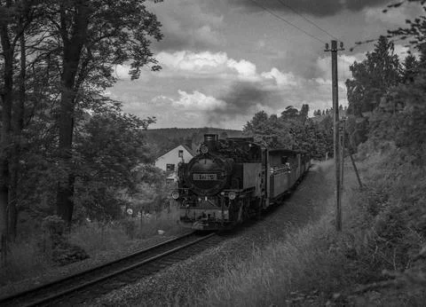 Steam engine train with passengers in summer day near Neudorf Germany 06 14.. Stock Photos