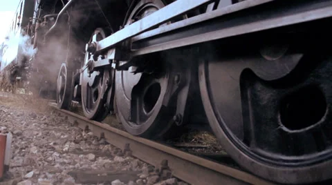 Steam engine wheels. old train technology. slow motion Stock Footage 34541704