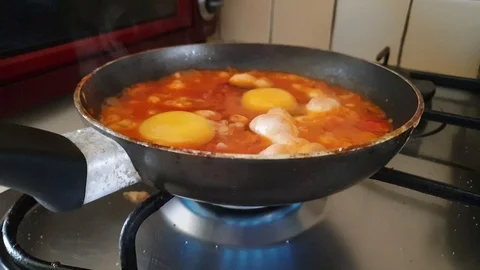 Steam from frying pan Stock Footage 114646900