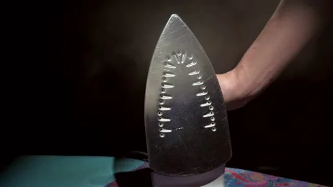 Steam function on iron front view Stock Footage 152864668