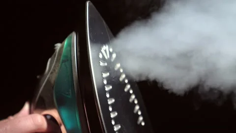 Steam function on iron side view Stock Footage 152864734