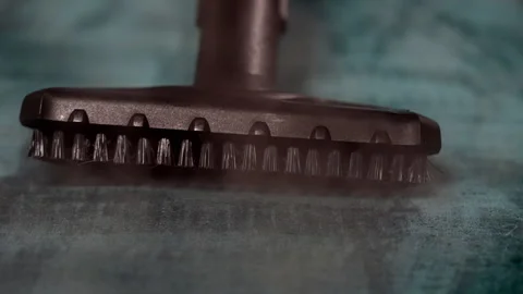 A steam generator with a brush cleans textile surfaces. Stock Footage 312625346