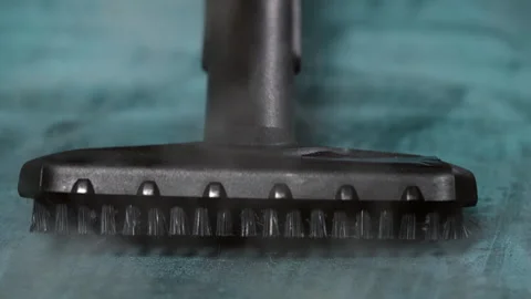 The steam generator brush cleans textiles. Stock Footage 312625325
