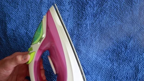 Steam from a hot iron Stock Footage 77023019