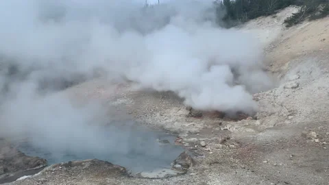 Steam from Hot Spring in Wind HD Stock Footage 179174396