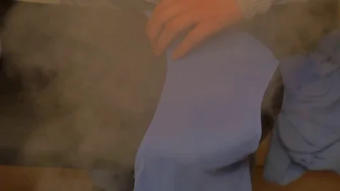 Steam from the iron Stock Footage 85048123