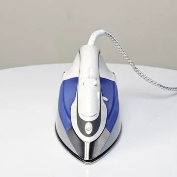 Steam iron from front Stock Photos