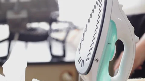 Steam iron steaming - close up Stock Footage 35972196