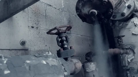 Steam leaking from industrial pipe Stock Footage 105933685