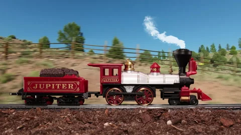 Steam Locomotive Engine Jupiter model toy train travels down tracks animation Stock Footage 224581503