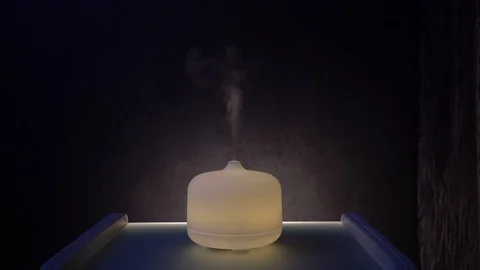 Steam from a luminous humidifier 库存影片 120126939