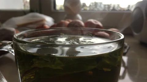 Steam motion over mint tea glass Stock Footage 60224003