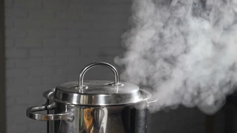 Boiling green kettle boiling with steam , Stock Video