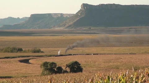 Steam passenger train in a rural setting Video stock 56985412