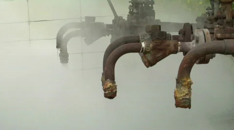 Steam pipes venting Stock Footage 115499