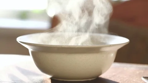 The steam rises above the plate Stock Footage 83760690
