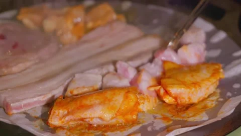 Steam rises from grill lined with parchment paper. Stock Footage 328617194
