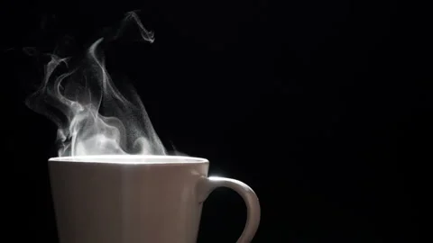 Steam Rises from a Mug of Coffee HD Stock Footage 342021405
