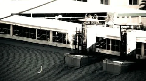 Steam Rises from Smoke Stack in Factory Stock Footage 22412005