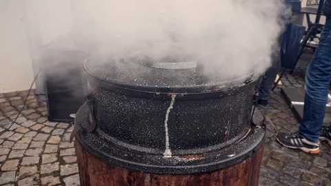 Steam rising from a boiling pot Stock Footage 86190329