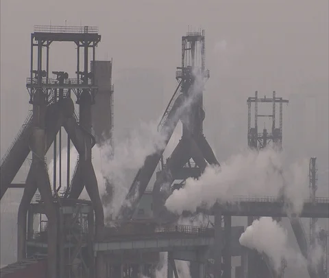 Steam rising from coal burning power plant Stock Footage 86744485