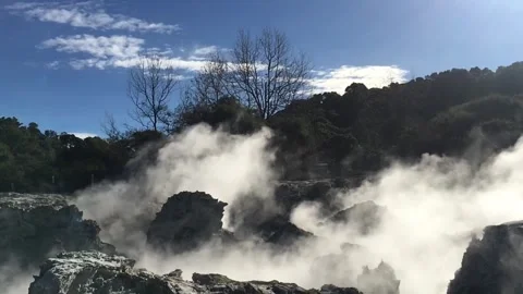 Steam rising from a natural hot spring Stock Footage 341875390