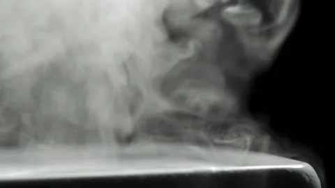 Steam from a steam generator close-up. Thick white smoke on a black background. Stock Footage 156748361