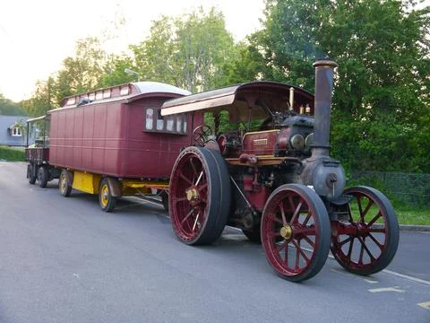 A steam traction engine towing a authentic caravan and trailer Stock Photos