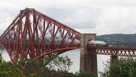 Steam Train "The Aberdonian" crossing the Forth Railway Bridge, Scotland Video stock 113952486