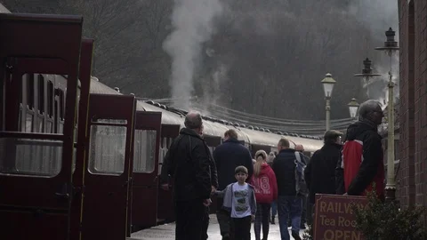 Steam Train and people boarding train UK England 4K Stock Footage 125072953