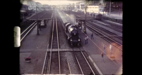 Steam Train Arriving at Station Platform – 1975 Super 8 Footage 스톡 동영상 330739114