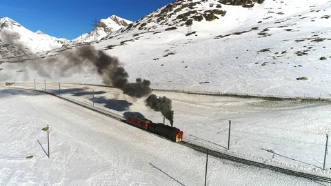 Steam train of Bernina, snowplow train on Bernina Pass. Stock Footage 103498155