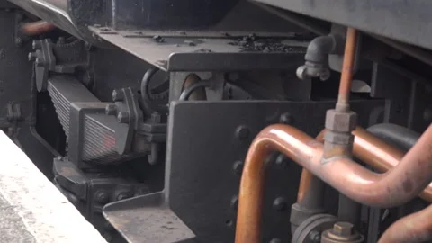 Steam Train close up old style image wheels turning close up UK England 4K Stock Footage 316988753