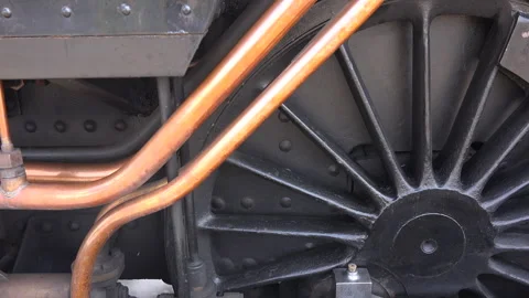 Steam Train close up old style image wheels turning close up UK England 4K Stock Footage 316988887