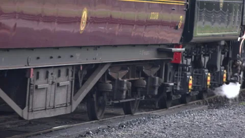 Steam Train close up old style image wheels turning close up UK England 4K Stock Footage 316989347