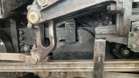 Steam Train close up of wheels turning slowly on trackUk 4K Video stock 275233556