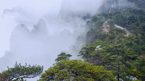 A steam train is coming down the mountain 스톡 동영상 156843769